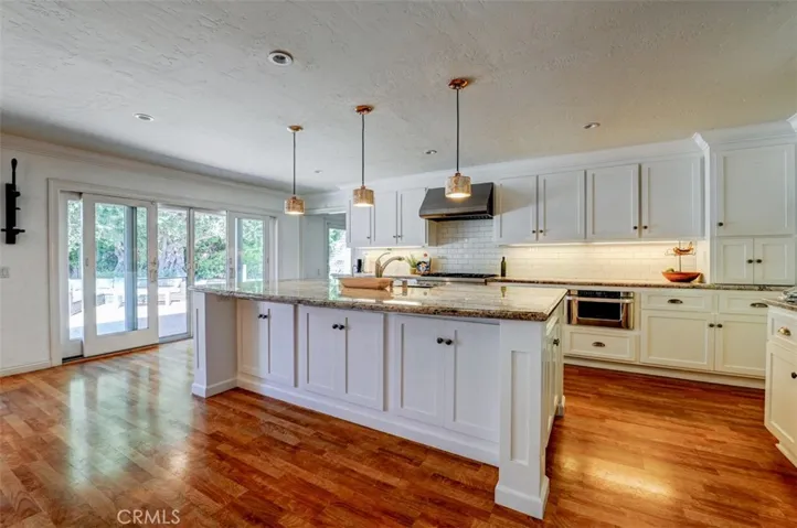 Large kitchen island that serves as the epicenter of the home.