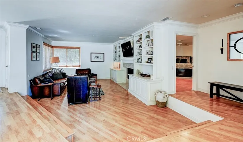 Lovely wood flooring throughout.