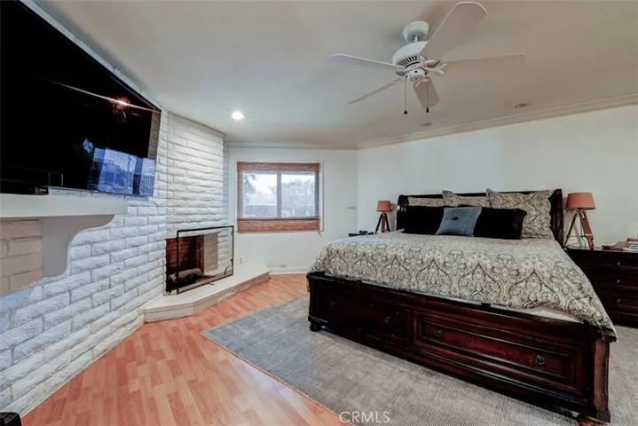 Large primary suite with fireplance.