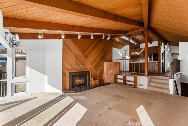 Separate dining room with elevated ceiling
