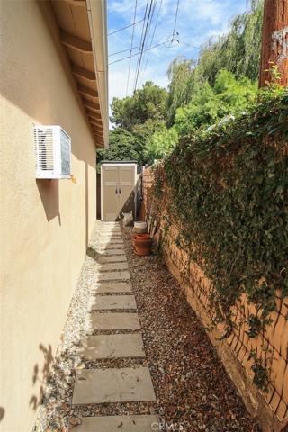 Behind garage & office