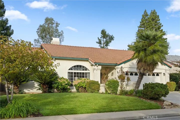 Beautiful front lawn and mature landscaping