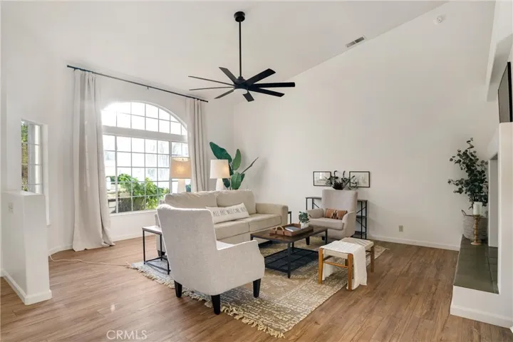 Huge window in living room lets in lots of light