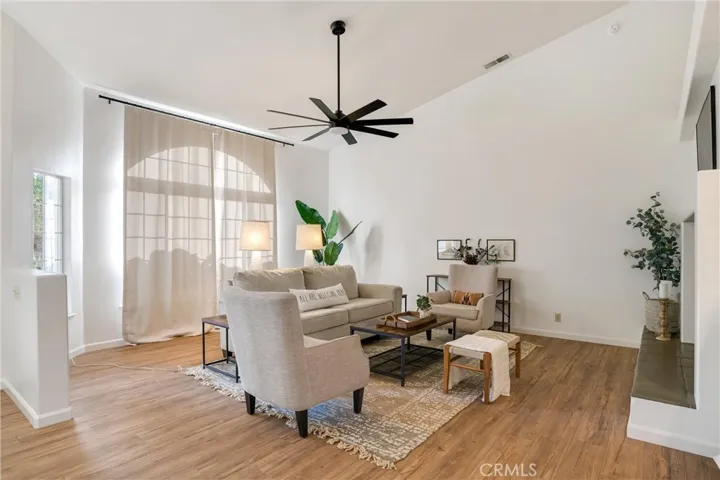 Another view of the living room. Nice vaulted ceiling!