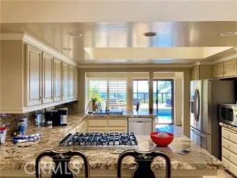 Kitchen with granite counters, ocean views.
