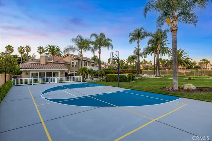Basketball court, also painted for pickle ball and the net is included.