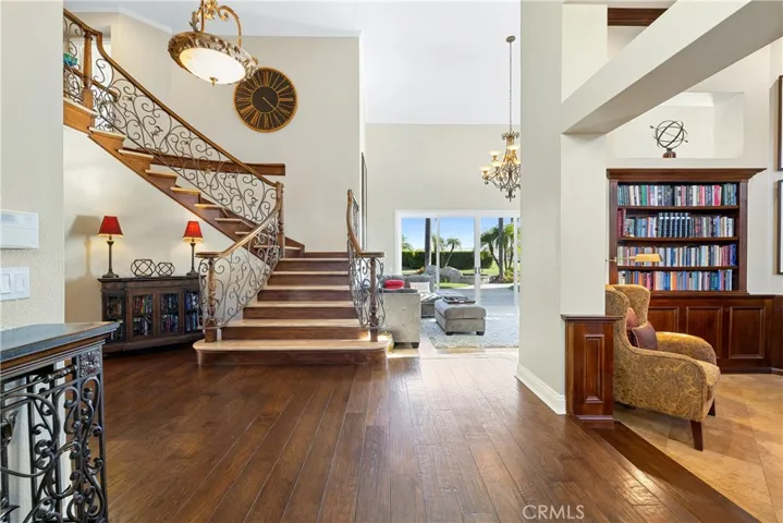 Entry view of the staircase and to the formal living room.