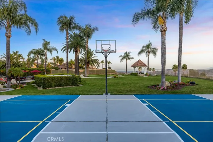 Basketball court, also painted for pickle ball and the net is included.