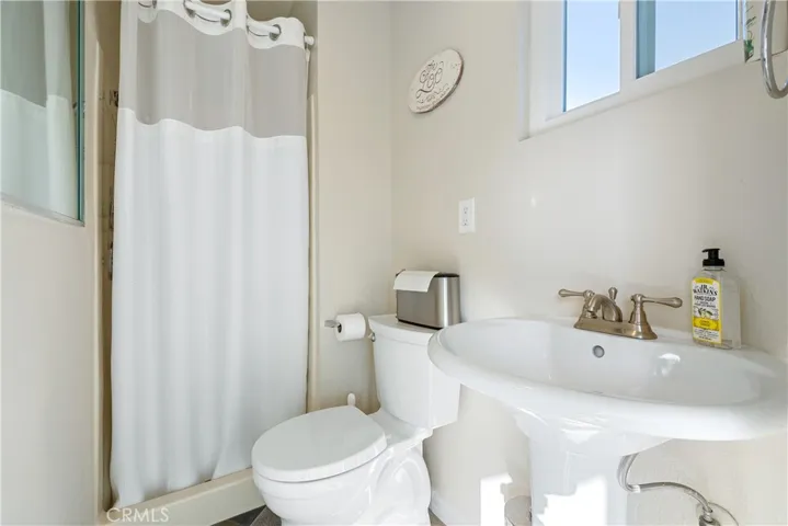 Guest house bathroom with shower.