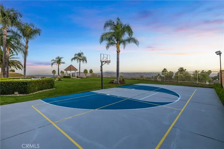 Basketball court toward the view, also painted for pickle ball and the net is included.