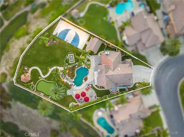 Overhead shot with property boundary lines.