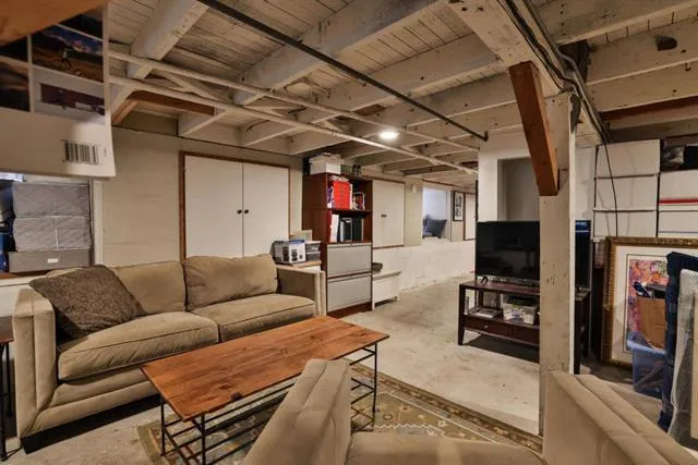 Plenty of room for a seating area w/ TV and a table to fold your laundry on!