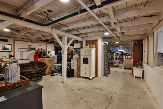 Expansive 800 SF semi-finished basement with tons of storage and ample room for exercise equipment.
