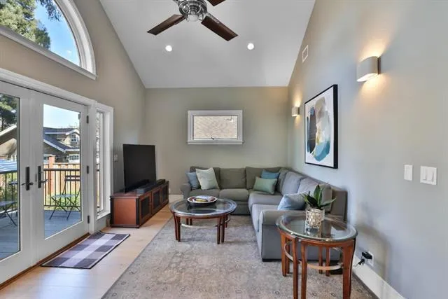 Layout 1 as a family room with closet office, high-end ceiling fan light fixture & recessed lighting