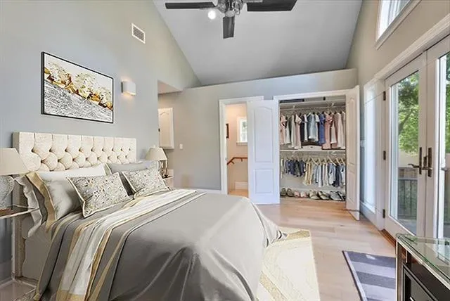 Layout 2 as a bedroom. By the closet, there's an entrance to the basement and a side exterior door