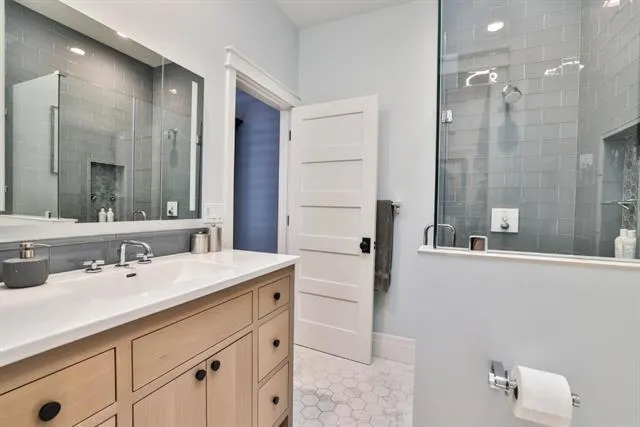 5-panel wood doors; custom vanity; high-end chrome fixtures; lights with speaker system