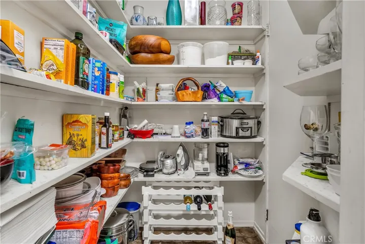 Walk-in pantry adjacent to the kitchen