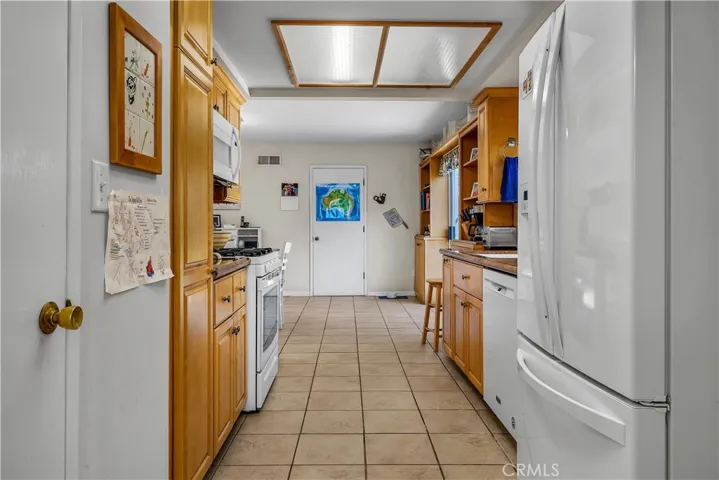 kitchen with a microwave and gas oven