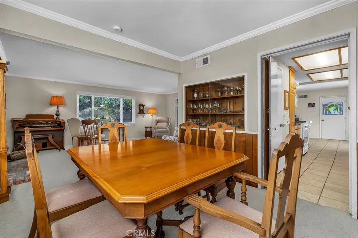 Dining room with easy access to the kitchen and living room