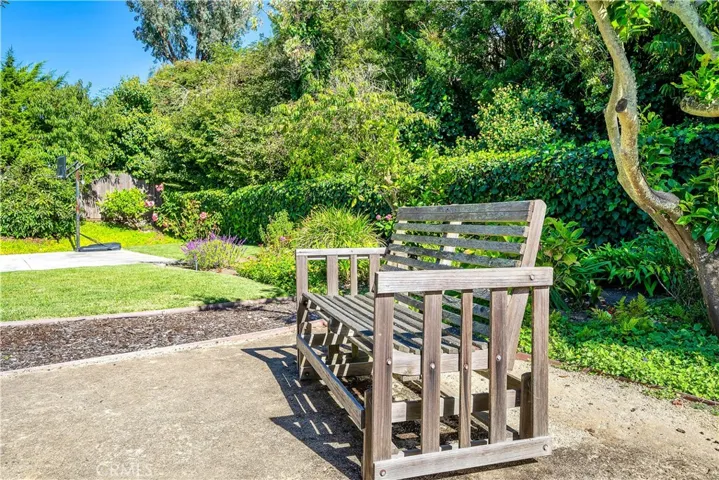 Bench for solitude..Reading, listening to much is, Meditating and enjoying the beautiful flowers.  Watching the sports from a safe distance