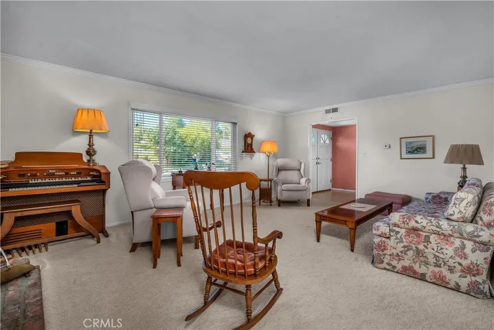 Another view of the living room with a large picture window