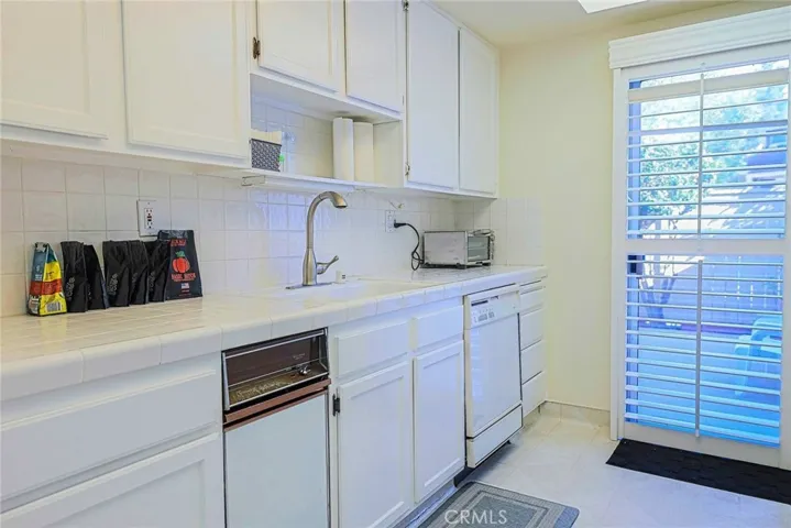 Kitchen with access to yard