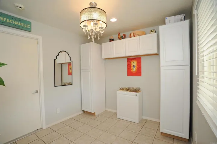 This room off the kitchen is perfect for a craft room or office