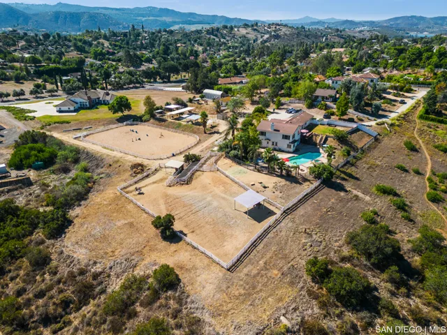 Blossom Valley Horse Property with ADU, riding arena, horse corrals and much more!