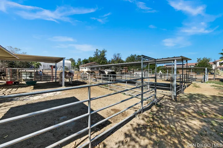 7 horse stalls with shelters and auto waterers