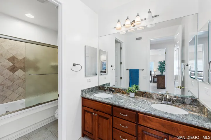 Full hall bathroom includes jacuzzi tub