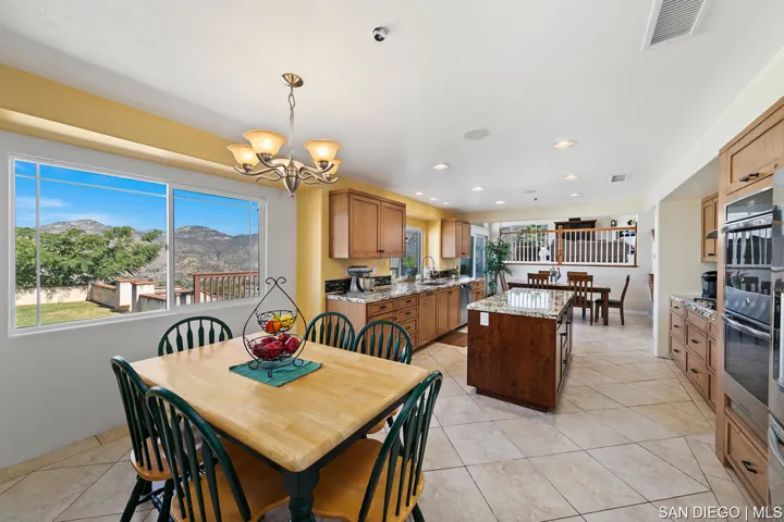 stainless steel appliances, kitchen is open to to great room