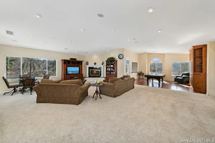 Great Room includes billiard area, built-ins and home gym that can be converted to a bar, man-cave,