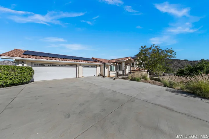 Front view of Main House and 3 car garage