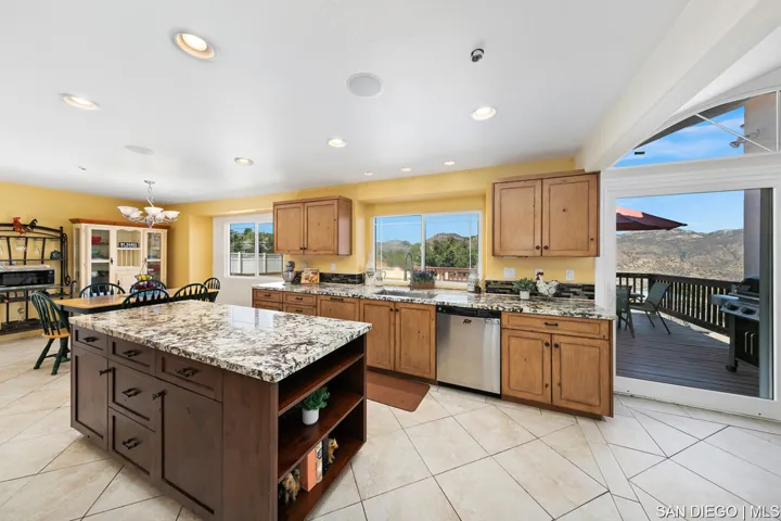 Knotty alder cabinetry has soft-close doors
