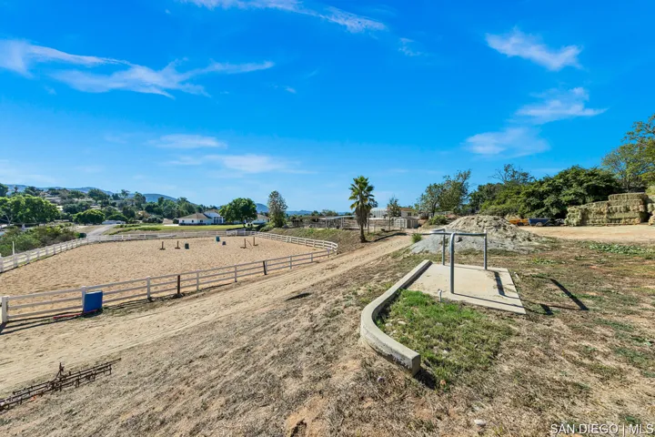 half-acre turnout with shelter, waterer and new hot-wire system