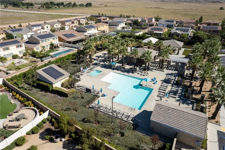 Aerial of 1 of 3 community pools.
