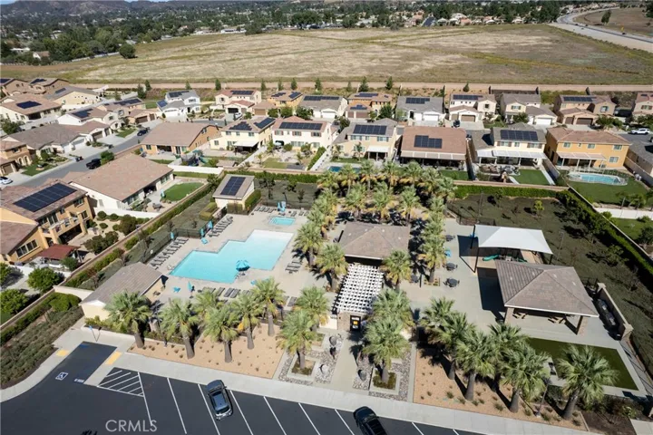 Aerial of 1 of 3 community pools.