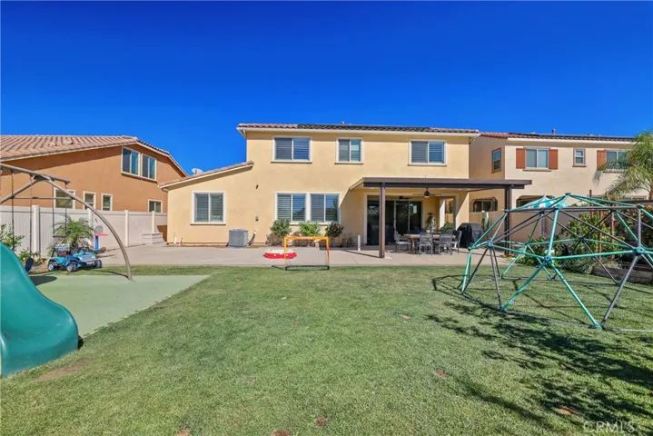 Fully landscaped and hardscaped backyard.
