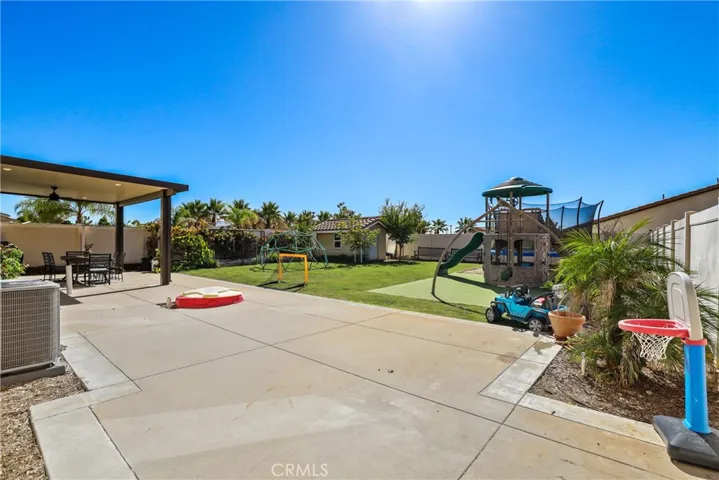 Fully landscaped and hardscaped backyard.