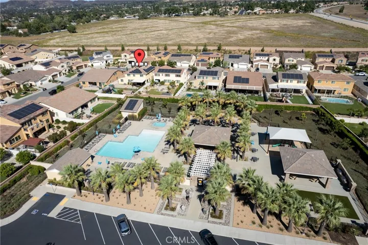 Aerial of 1 of 3 community pools.