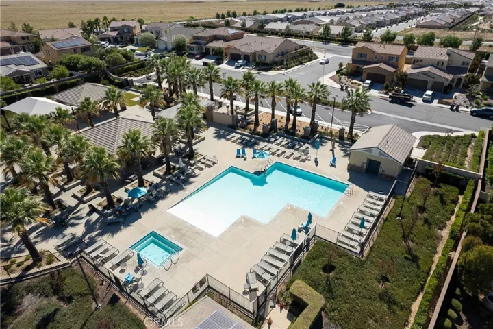 Aerial of 1 of 3 community pools.