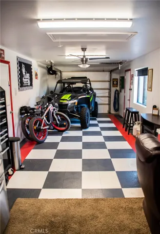 Toy garage and office area next to RV garage/Workshop.