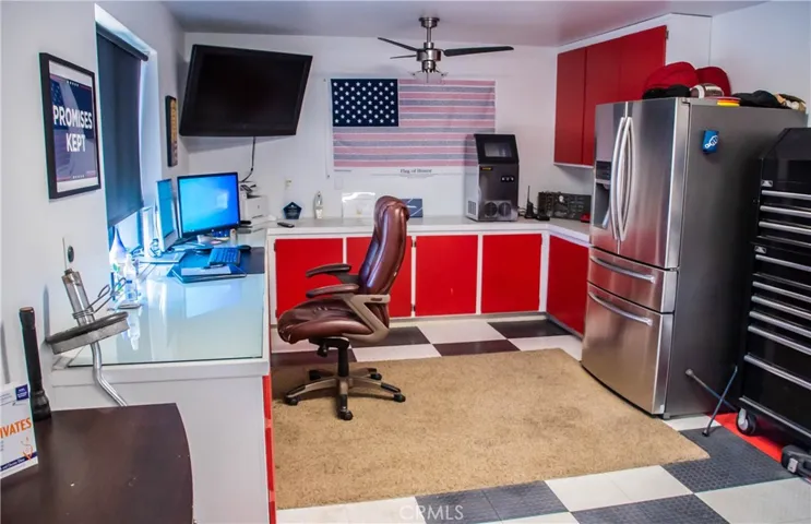Toy garage and office area next to RV garage/Workshop.