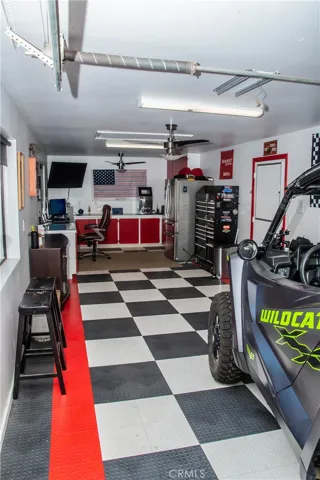 Toy garage and office area next to RV garage/Workshop.