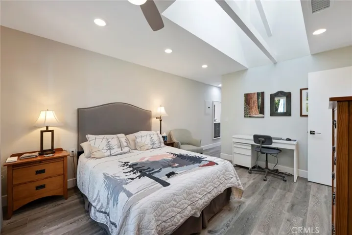 An attached En Suite and Walk-in Closet are down the hallway!