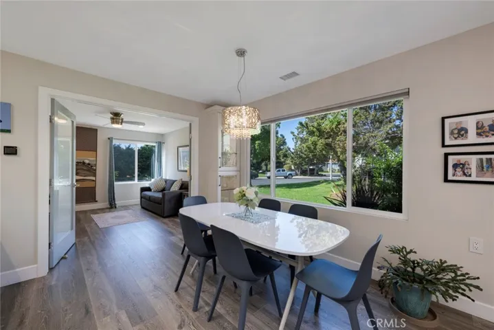 Dining Room with 2nd Bedroom (currently used as an Office) with French Doors in the back ground!
