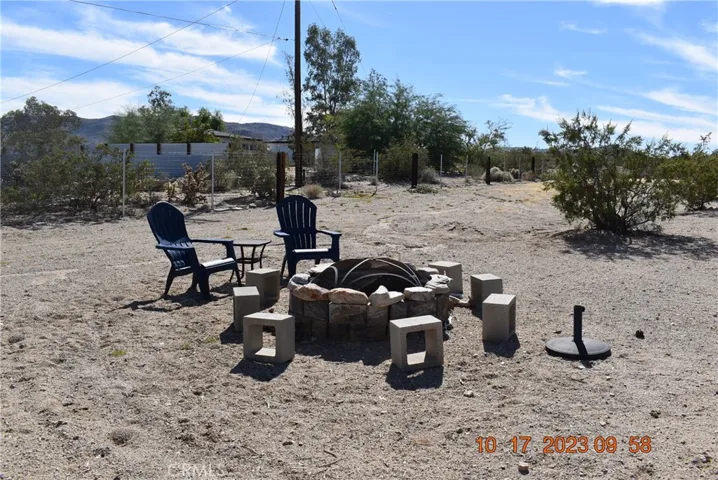 Outside fireplace on lotnext house but being sold with the property. Seller bought all as one parcel in 2007