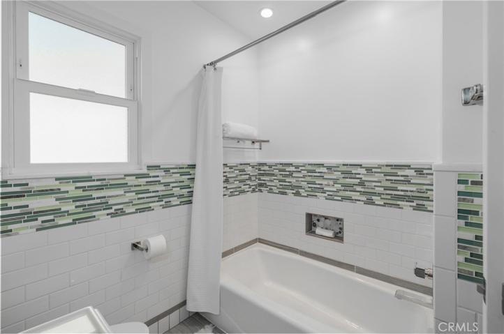 High end Kohler fixtures, pedestal sink & attractive flooring.