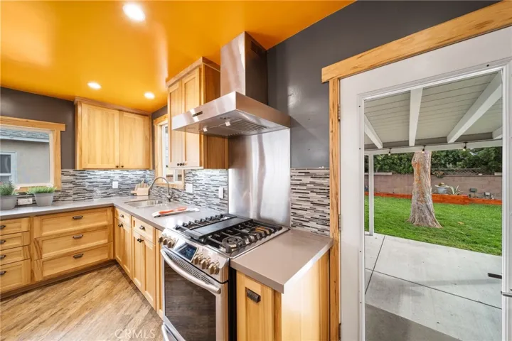 Direct access to backyard from kitchen for entertaining needs