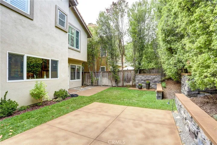 Private and serene wrap around backyard with plenty of space for perfect outdoor living